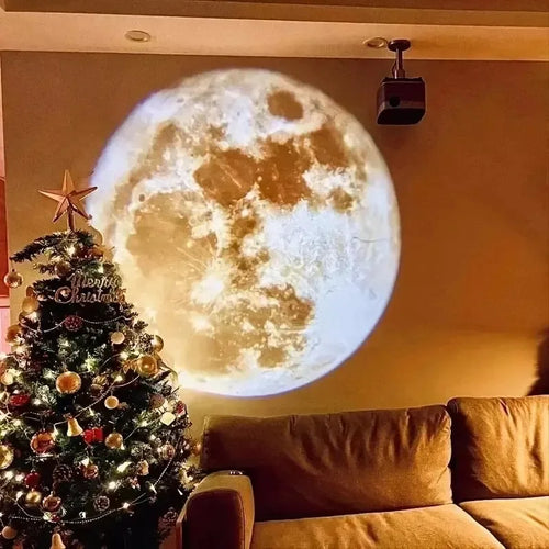 A moon projection glowing on a living room wall beside a lit Christmas tree