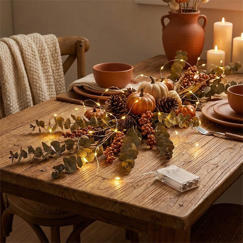 Battery Fairy Light String woven through an autumn table centrepiece